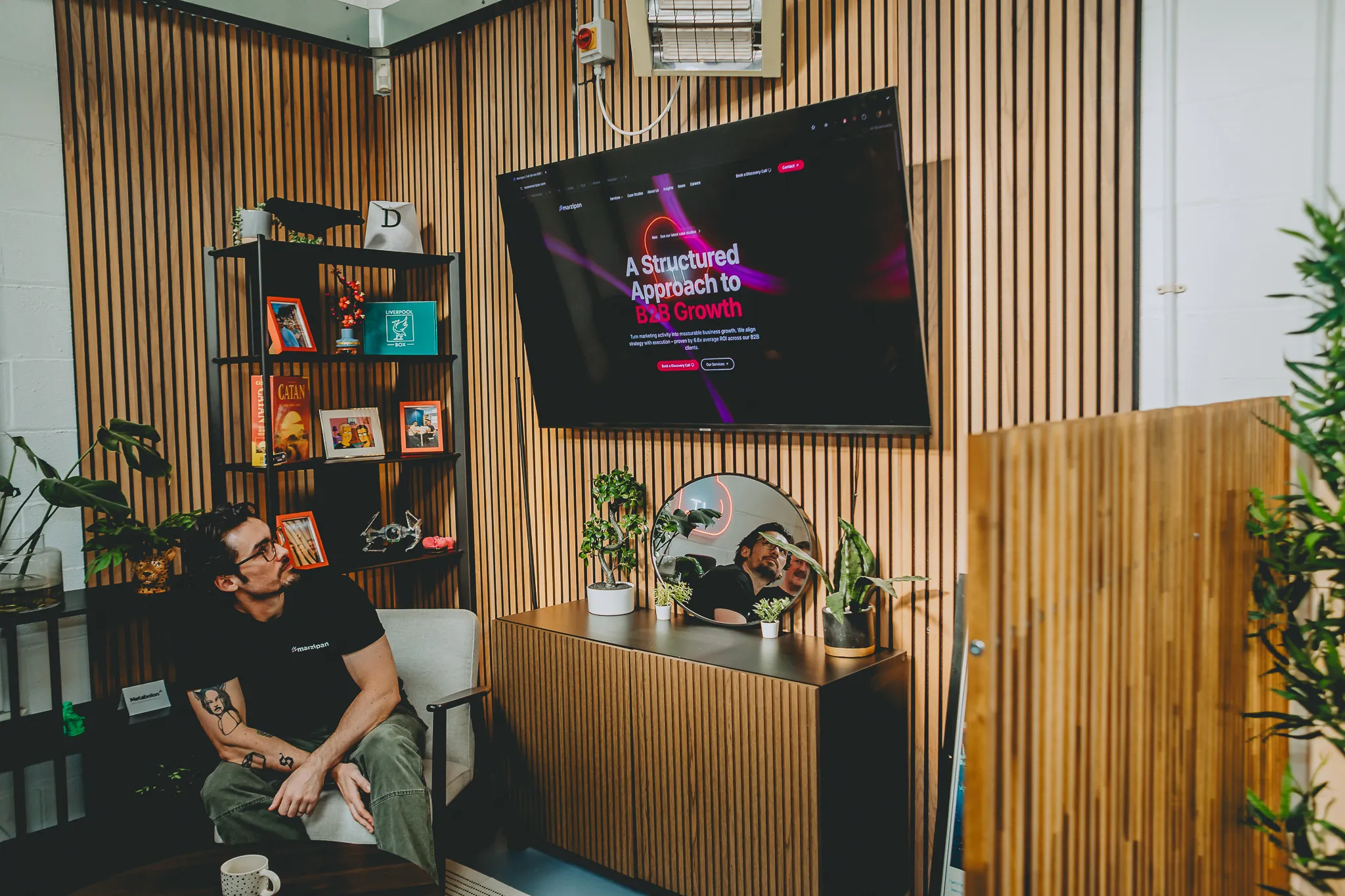 A Marzipan marketer reviewing AI-assisted campaign content in the studio
