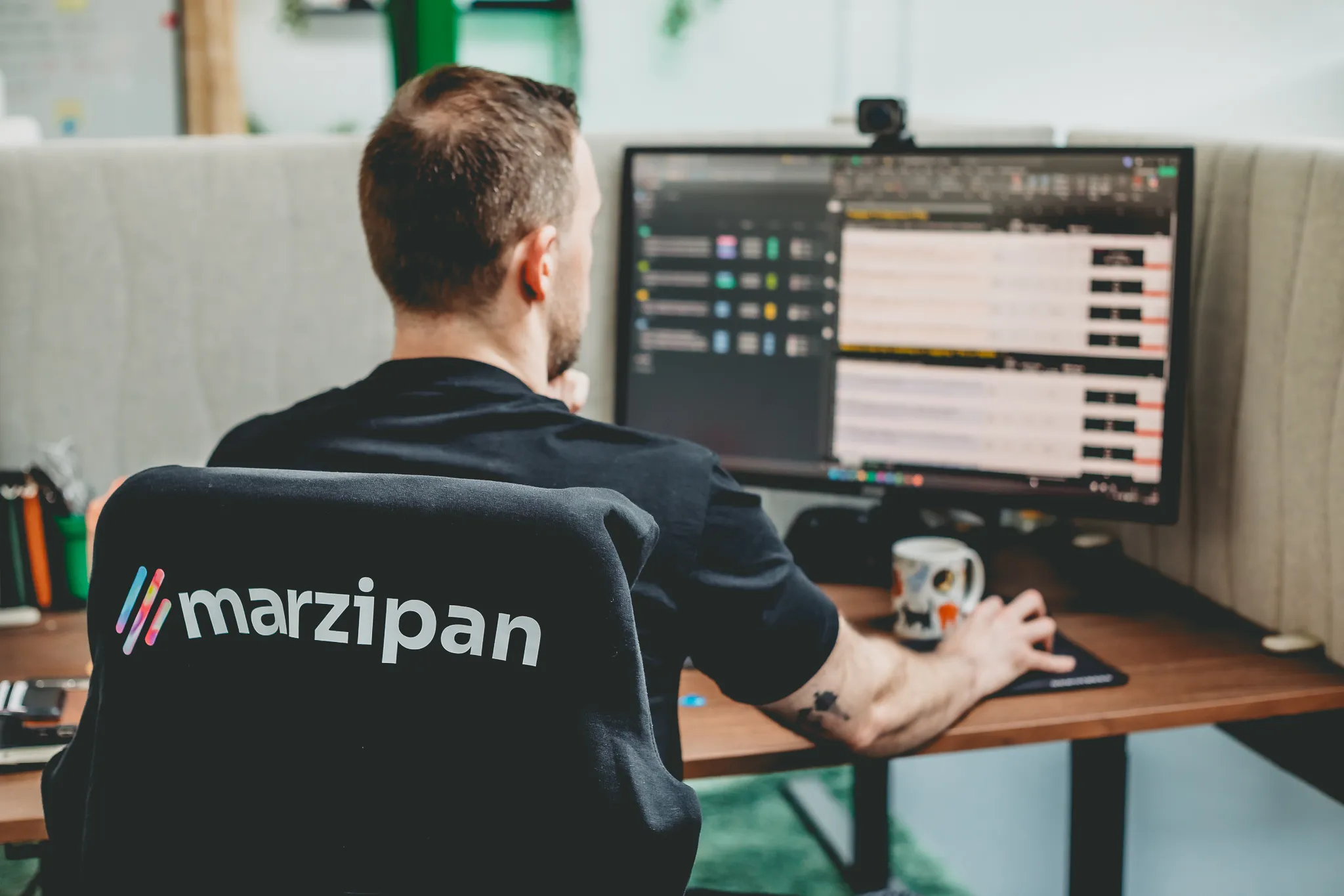 A Marzipan marketing specialist reviewing lead data and scoring on screen