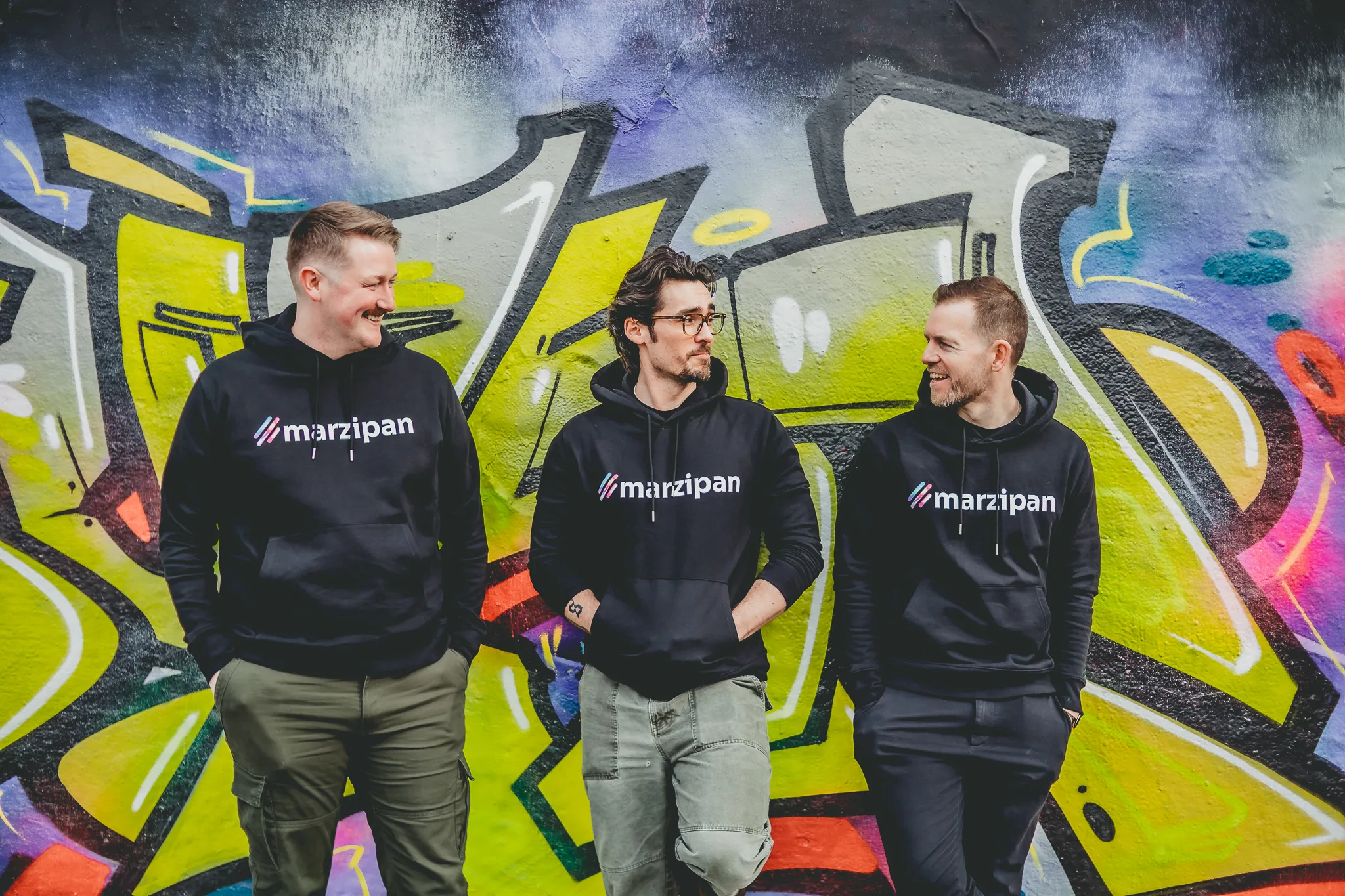 The Marzipan team in Marzipan hoodies